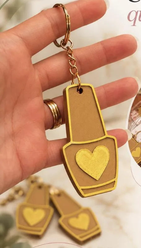 Chaveiro abridor de latinha em formato de esmalte, dourado